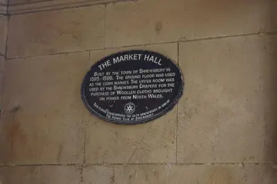 a plaque on the wall of a building at Chandeliers 6 in Shrewsbury