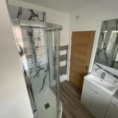 a bathroom with a shower and a sink at Georgian 3 bed house in historic town centre in Shrewsbury