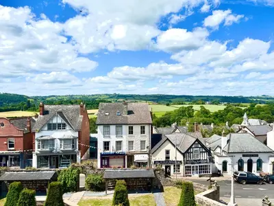 an aerial view of a town with houses at Wye View Lodge, Hay View Lodges in Hereford