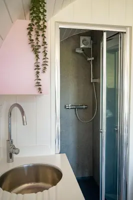 a bathroom with a sink and a shower at Celyn in Welshpool