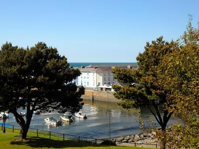 a view of a river with boats in it at Cerniw - Cottage in Aberaeron
