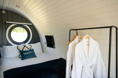 a bedroom with a bed and a window at Bedwen in Welshpool
