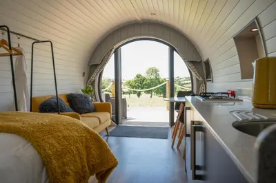 a kitchen and living room in a tiny house at Derwen in Welshpool