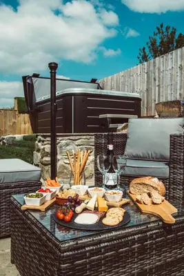 a table filled with food on top of a patio at Swallows Rest in Montgomery