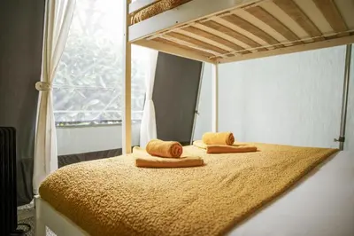 a bed with two towels on top of it at King Fisher in Nantmel