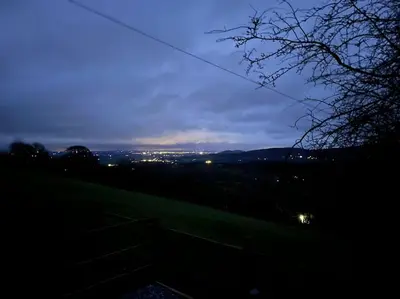 a view of a city at night at Ramblers retreat in Shrewsbury
