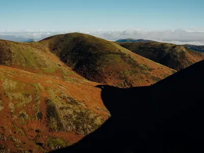 an aerial view of a mountain with hills at The Coach House Barn in Shrewsbury