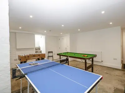 a ping pong room with a ping pong table at Belle Vue in Hereford