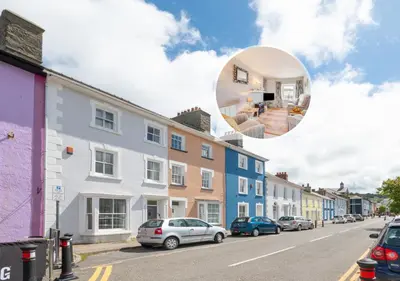 a collage of photos of a street with houses at Angorfa Aberaeron Apartment in Aberaeron