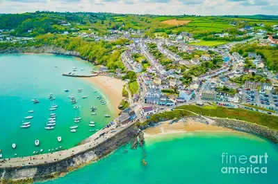 an aerial view of a harbor with boats in the water at Gorwel, Spacious 3 Bedroom Cottage near the Beach in Llanarth